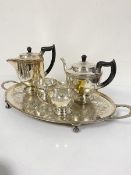 An Epns engraved two handled tea tray and an Epns four piece tea and coffee service decorated with