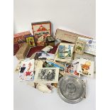 A collection of humerous and pictorial postcards, Monopoly game, various card packs, cigarette