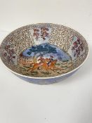 A modern Chinese reproduction porcelain hunting style bowl decorated with hounds and horsemen,