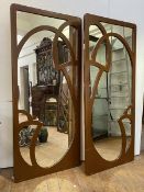 A Pair of painted wall mirrors of Art Nouveau design, the rectangular mirror plate with applied fret