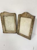 Two Edwardian Birmingham silver mounted photograph frames, one with scroll arched surmount and