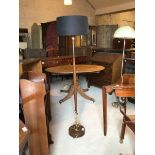 A mid century teak and chromed standard lamp with decorative shade, H152cm