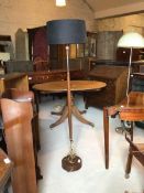 A mid century teak and chromed standard lamp with decorative shade, H152cm