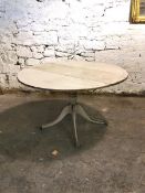 Regency style white painted drop leaf dining table, the circular top raised on turned column and