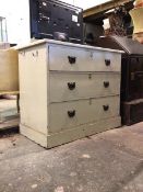 An Edwardian painted pine chest, of three graduated drawers, raised on skirted base, H82cm, W99cm,