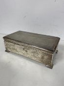 A 1930s/40s Chester silver cigarette box with engine turned hinged top, divided wooden interior,