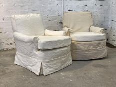 A Pair of upholstered lounge chairs, first half of the 20th century, with fitted cotton cover and