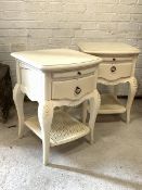 A Pair of French style cream painted bedside tables, each fitted with a slide and a drawer, raised