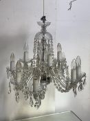 A late 20th century Venetian style cut glass chandelier, with ceiling rose, baluster stem, twelve