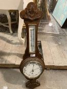 A 1920s banjo style oak barometer with thermometer to neck (77cm)