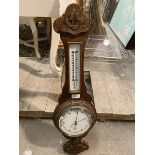 A 1920s banjo style oak barometer with thermometer to neck (77cm)