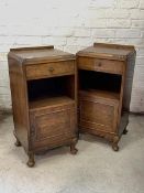 A pair of Queen Anne style figured walnut bedsides, with raised back over cross banded top, above