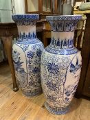 A near pair of Chinese blue and white baluster shaped vases, unmarked (each: 79cm)