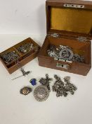 A quantity of costume jewellery, some silver, including chains, lockets, badges, brooch with Greek
