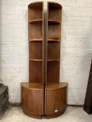 G-Plan - A pair of vintage teak bow front corner illuminated display stands, each with three open