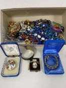 A quantity of costume jewellery including necklaces, brooches, earrings, badges (a lot)