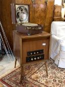 A Whiteley Electrical radio in a mahogany case raised on turned supports, together with a walnut