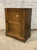 A 19th century pine cupboard, with drawer enclosing shelves, raised on a skirted base with