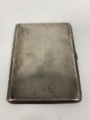 A 1930s/40s silver engine turned cigarette case (11cm x 9cm) (150g)