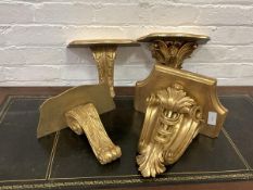 A Pair of Rococo style gilt wall brackets (W31cm) and two other similar (W34cm)