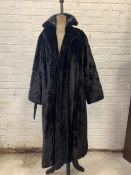 A Lady's sable full length fur coat, with short collar, satinized lining and slit pockets to side,