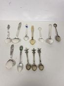 A collection of souvenir spoons, some silver, including a TH Marthinson Norway, with enamelled
