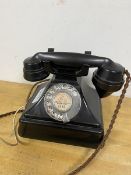 A vintage bakelite telephone, the rotary dial inscribed Granton (20cm)