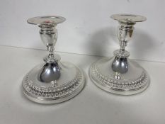 A pair of Viners candlesticks, with silvered finish (15cm)