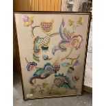 A 1930s embroidered panel depicting scrolling vine with flowers (65cm x 48cm)