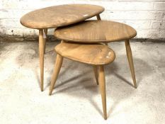 Ercol - A blonde elm 'Pebble' nest of three tables, H39cm, W66cm, D45cm