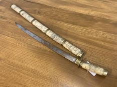 Short samurai sword, sheath in segments each with bone carved with traditional Japanese scenes, also