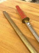 A samurai sword with sheath, hand guard with figure behind flag in relief, L104cm