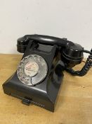 A vintage bakelite cased GPO telephone, register inscribed Baillieston (h.15cm)