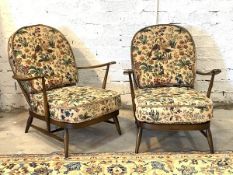 Ercol - A pair of model 203 beech and elm lounge chairs, circa 1970, with upholstered cushions,