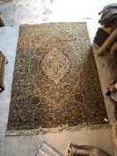 A Persian Tabriz design ground carpet, the central medallion on field profusely decorated with