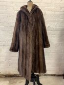 A 1940's/1950's 3/4 length mink coat, retailed by Arnold Sefton, Edinburgh, satinized lining and