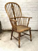 A 19th century elm and ash Windsor chair, the double hoop, spindle and splat back over saddle