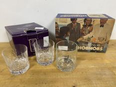 A pair of Edinburgh Crystal whisky glasses, etched with crest, with original box (each glass: 8cm