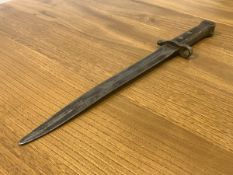 A 1930's Wilkinson bayonet, inscribed Wilkinson London to base of blade on one side with a crown