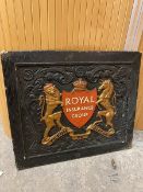 An ebonised wooden panel bearing the coat of arms for the Royal Insurance Group (47cm x 55cm)