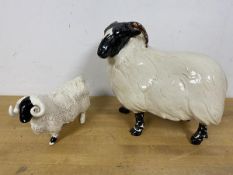A coin bank in the form of a Sheep, base stamped Created for Bayer by David Sharp (20cm) and another