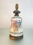 A Chinese famille rose porcelain jar mounted as a table lamp, the vase of shaped double gourd