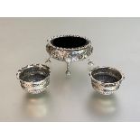 A group of Victorian silver salts comprising: a cauldron salt, London 1865, oval, chased with