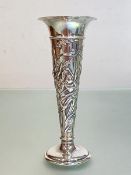 An Edwardian silver bud vase, William Comyns, London 1902, of trumpet form, chased with iris and