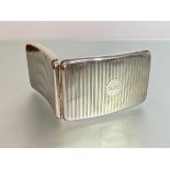 A large George V silver cigarette case, Charles S. Green & Co., Birmingham 1918, shaped for the