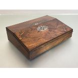 A handsome Victorian rosewood writing slope, fitted with a stationery box with divisions and ink