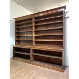 A large mahogany library open bookcase, c. 1900, the cavetto cornice over ten adjustable shelves,
