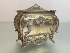 An Edwardian silver tea caddy, George Nathan & Ridley Hayes, Chester 1909, of bombe form, the hinged