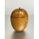 A fruitwood tea caddy in 18th century style, modelled as an apple, with hinged cover and key. Height
