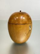 A fruitwood tea caddy in 18th century style, modelled as an apple, with hinged cover and key. Height